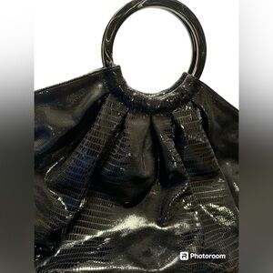 Black Brahmin size medium. Used. Ready to be worn with the perfect outfit.